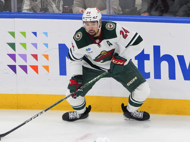 ELMONT, NY - JANUARY 12: Minnesota Wild Defenseman Matt Dumba (24) controls the puck during the second period of the National Hockey League game between the Minnesota Wild and the New York Islanders on January 12, 2023, at UBS Arena in Elmont, NY.