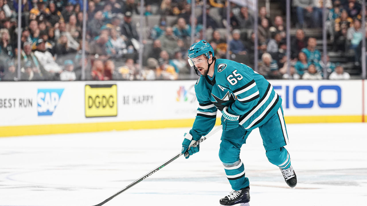 SAN JOSE, CA - JANUARY 7: Erik Karlsson #65 of the San Jose Sharks skates with the puck against the Boston Bruins at SAP Center on January 7, 2023 in San Jose, California.