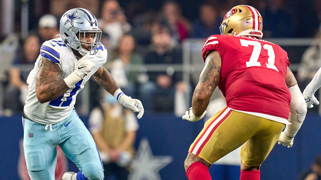ARLINGTON, TX - JANUARY 16: Dallas Cowboys outside linebacker Micah Parsons (11) battles with San Francisco 49ers offensive tackle Trent Williams (71) during the NFC Wild Card game between the San Francisco 49ers and the Dallas Cowboys on January 16, 2022 at AT&T Stadium in Arlington, TX.