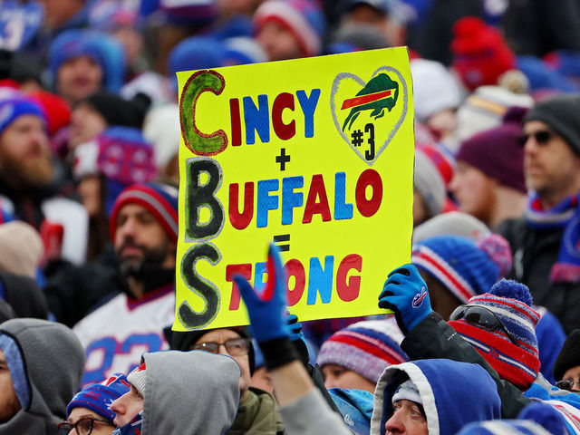 ORCHARD PARK, NEW YORK - JANUARY 08: Buffalo Bills fans hold signs in support of Buffalo Bills safety Damar Hamlin during a game against the New England Patriots at Highmark Stadium on January 08, 2023 in Orchard Park, New York. Hamlin suffered cardiac arrest during the Bills' Monday Night Football game against the Cincinnati Bengals and remains in intensive care.
