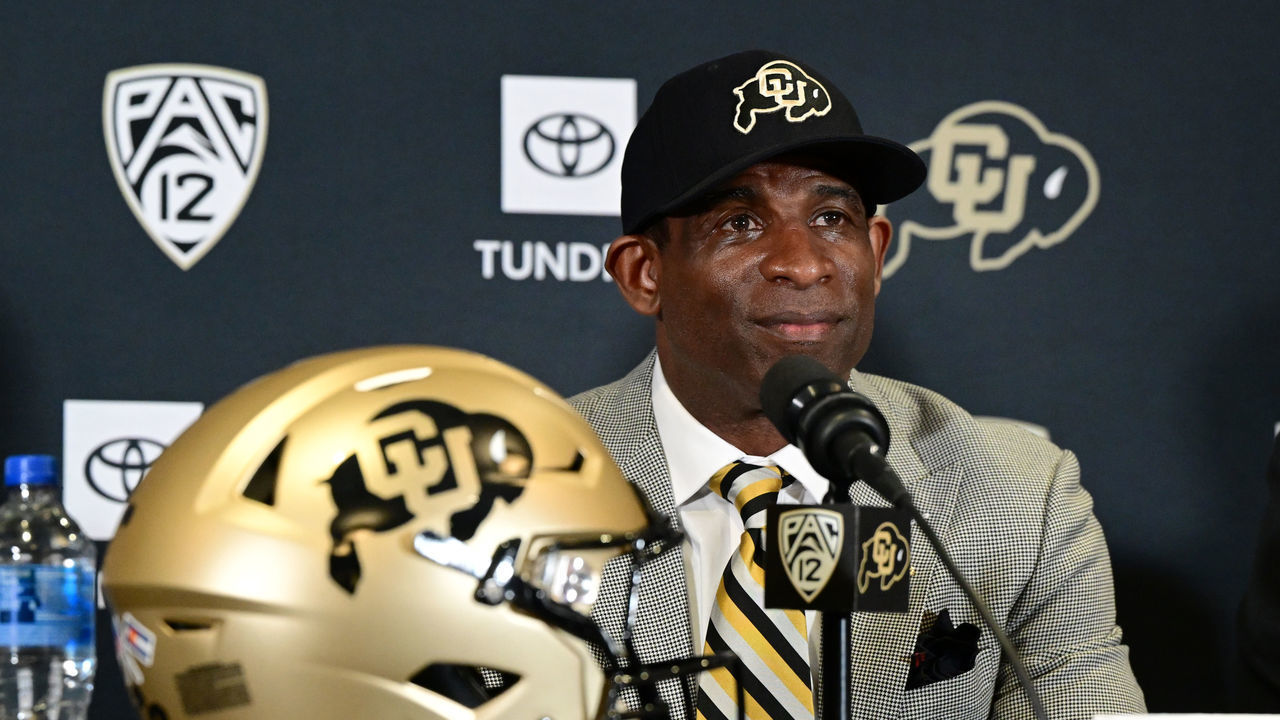 BOULDER, CO - DECEMBER 4: Deion Sanders, CUs new head football coach, takes questions in the Arrow Touchdown Club during a press conference on December 4, 2022 in Boulder, Colorado. CU held an introductory press conference to announce the hiring of Deion Coach Prime Sanders as the schools new head football coach. Chancellor Phil DiStefano and athletic director Rick George accompanied Sanders into a packed room in the Arrow Touchdown Club inside the Dal Ward Athletic Center. Sanders becomes the 28th head coach in Buffalo football history. Sanders, who known as Prime Time during his Hall of Fame playing career has since transitioned into Coach Prime as a head football coach. Sanders, 55, joins the CU program from Jackson State University where in three seasons the Tigers compiled a 27-5 record and won back-to-back Southwestern Athletic Conference championships.