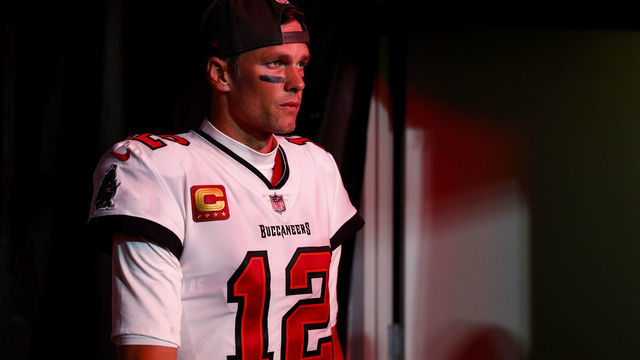 TAMPA, FL - JANUARY 16: Tom Brady #12 of the Tampa Bay Buccaneers walks through the tunnel prior to an NFL wild card playoff football game against the Dallas Cowboys at Raymond James Stadium on January 16, 2023 in Tampa, Florida.