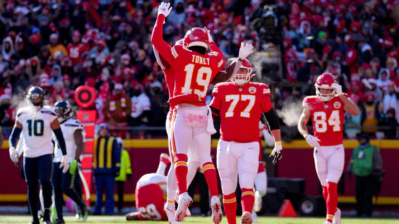 KANSAS CITY, MISSOURI - DECEMBER 24: Kadarius Toney #19 of the Kansas City Chiefs celebrates with JuJu Smith-Schuster #9 of the Kansas City Chiefs after Toney's touchdown during the first quarter against the Seattle Seahawks at Arrowhead Stadium on December 24, 2022 in Kansas City, Missouri.