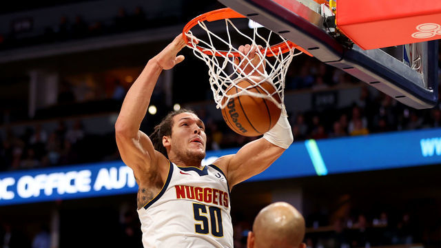 DENVER, CO - DECEMBER 14: Aaron Gordon #50 of the Denver Nuggets dunks against the Washington Wizards at Ball Arena on December 14, 2022 in Denver, Colorado. goes before your credit in the caption