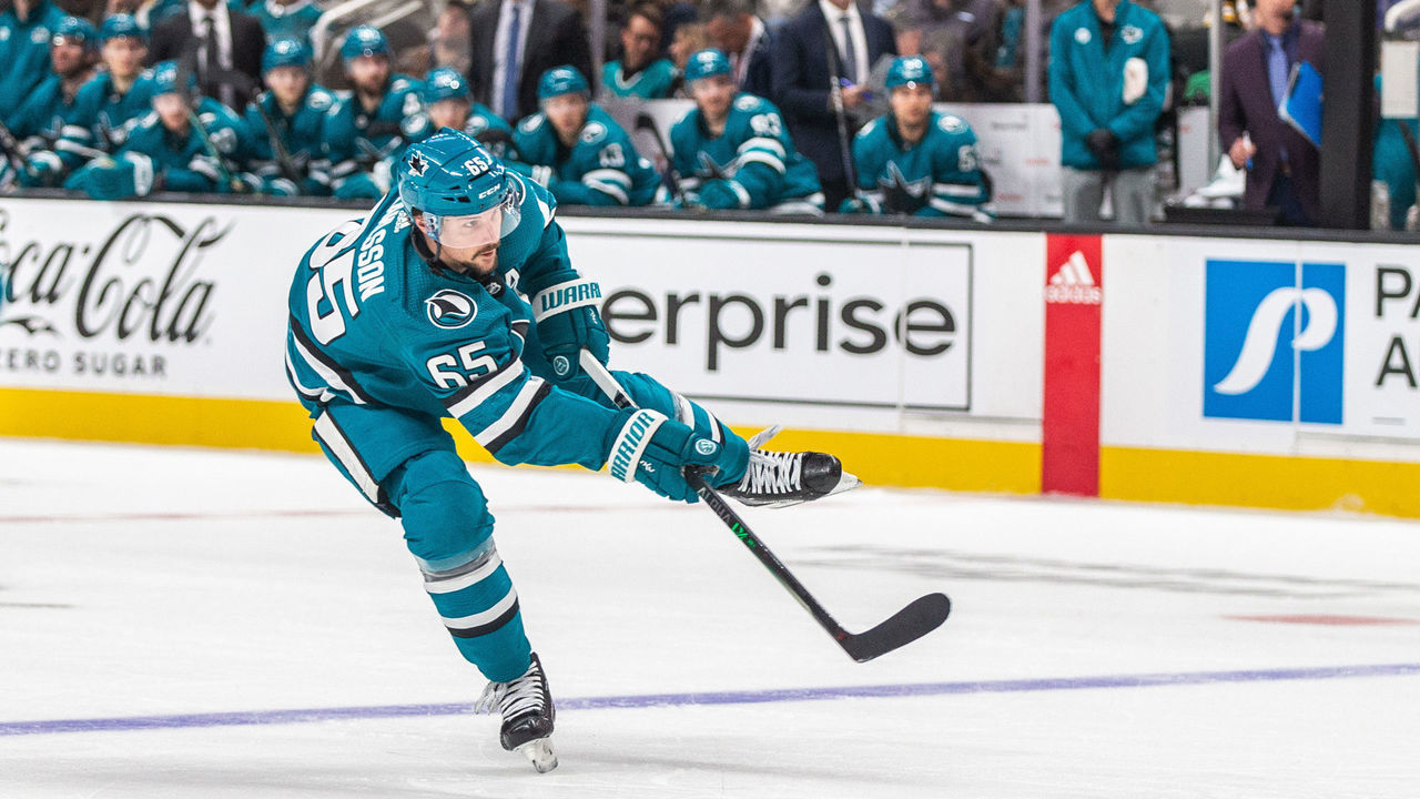 SAN JOSE, CA - JANUARY 07: San Jose Sharks Defenceman Erik Karlsson (65) takes a shot during the third period of a regular season NHL hockey game between the Boston Bruins and the San Jose Sharks on January 7, 2023, at SAP Center, in San Jose, CA.