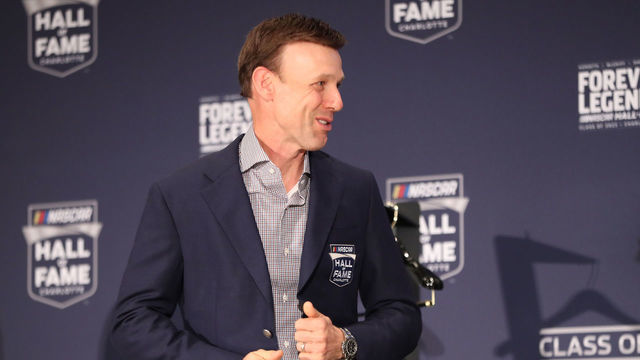 CHARLOTTE, NORTH CAROLINA - JANUARY 19: 2023 NASCAR Hall of Fame inductee, Matt Kenseth, is presented his blue jacket during the Blue Jacket Ceremony at NASCAR Hall of Fame on January 19, 2023 in Charlotte, North Carolina.