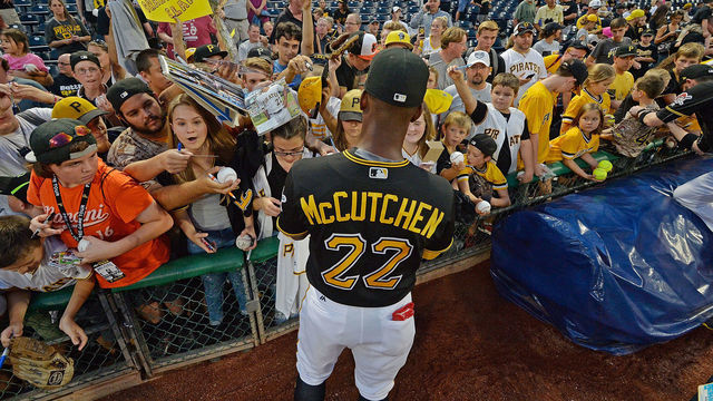 PITTSBURGH, PA - SEPTEMBER 27: Andrew McCutchen #22 of the Pittsburgh Pirates signs autographs for fans before the start of the game against the Baltimore Orioles at PNC Park on September 27, 2017 in Pittsburgh, Pennsylvania.