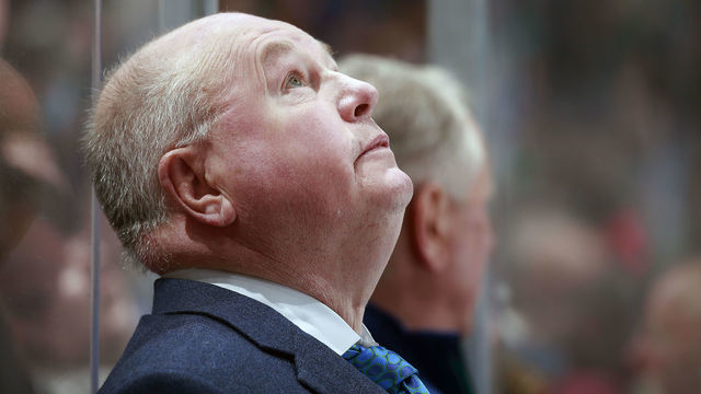 VANCOUVER, BC - APRIL 14: Head coach Bruce Boudreau of the Vancouver Canucks looks on from the bench during their NHL game against the Arizona Coyotes at Rogers Arena April 14, 2022 in Vancouver, British Columbia, Canada. "n