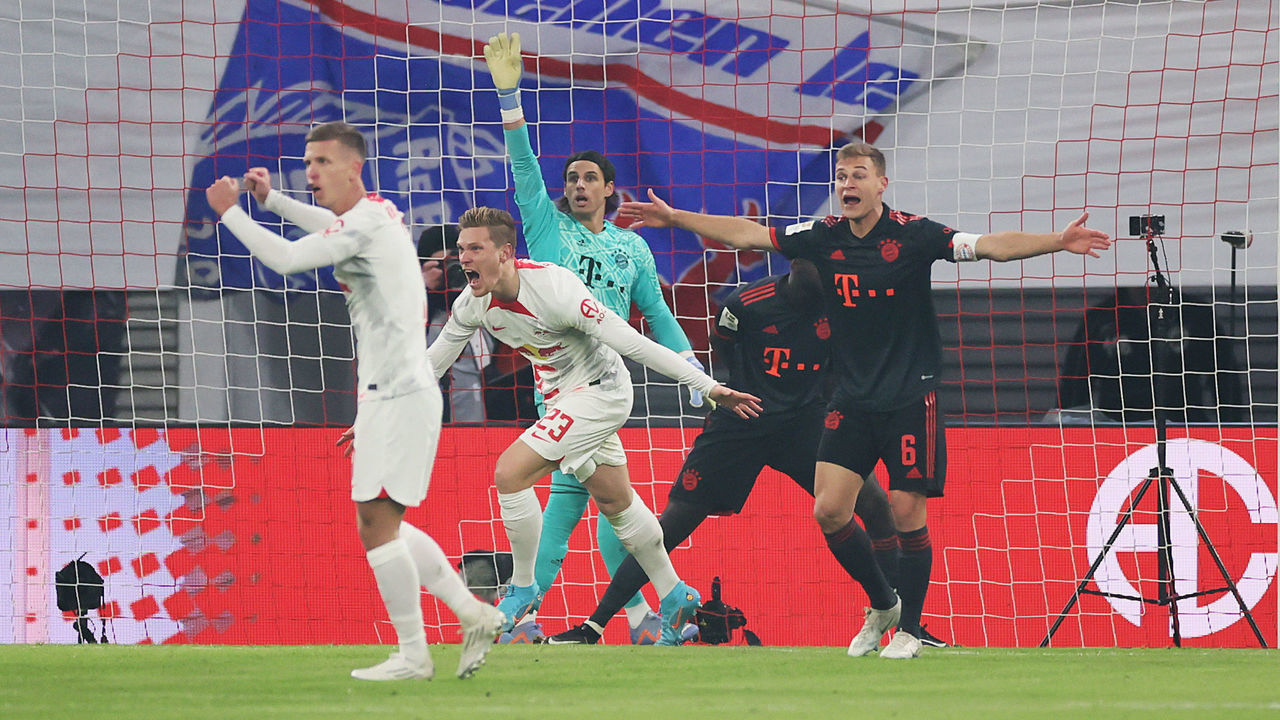LEIPZIG, GERMANY - JANUARY 20: Marcel Halstenberg of RB Leipzig celebrates after scoring the team's first goal during the Bundesliga match between RB Leipzig and FC Bayern Muenchen at Red Bull Arena on January 20, 2023 in Leipzig, Germany.