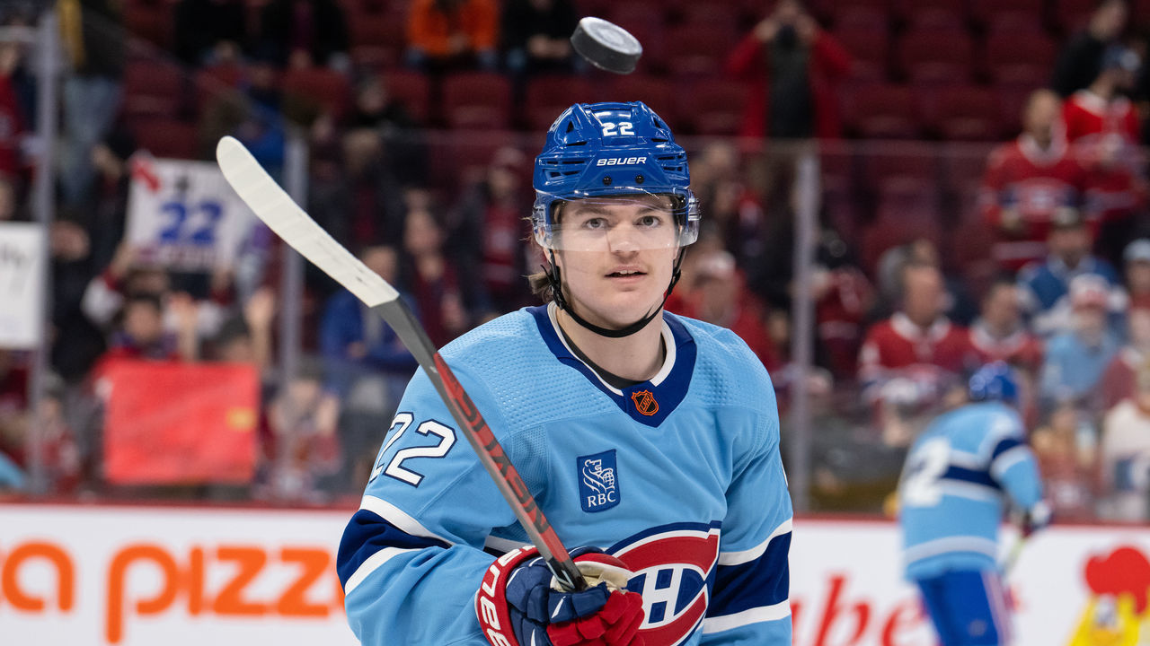 MONTREAL, QC - JANUARY 19: Cole Caufield (22) of the Montreal Canadiens bounces the puck on his stick during the warmup period of the NHL game between the Florida Panthers and the Montreal Canadiens on January 19, 2023, at the Bell Centre in Montreal, QC
