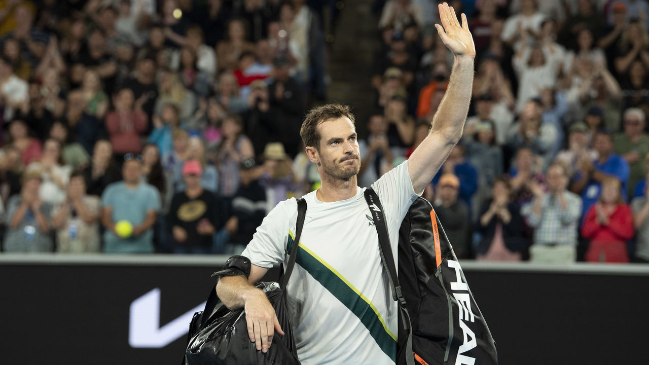 MELBOURNE, AUSTRALIA - JANUARY 21: Andy Murray of Great Britain leaves the court following his defeat in his third round singles match against Roberto Bautista Agut of Spain during day six of the 2023 Australian Open at Melbourne Park on January 21, 2023 in Melbourne, Australia.