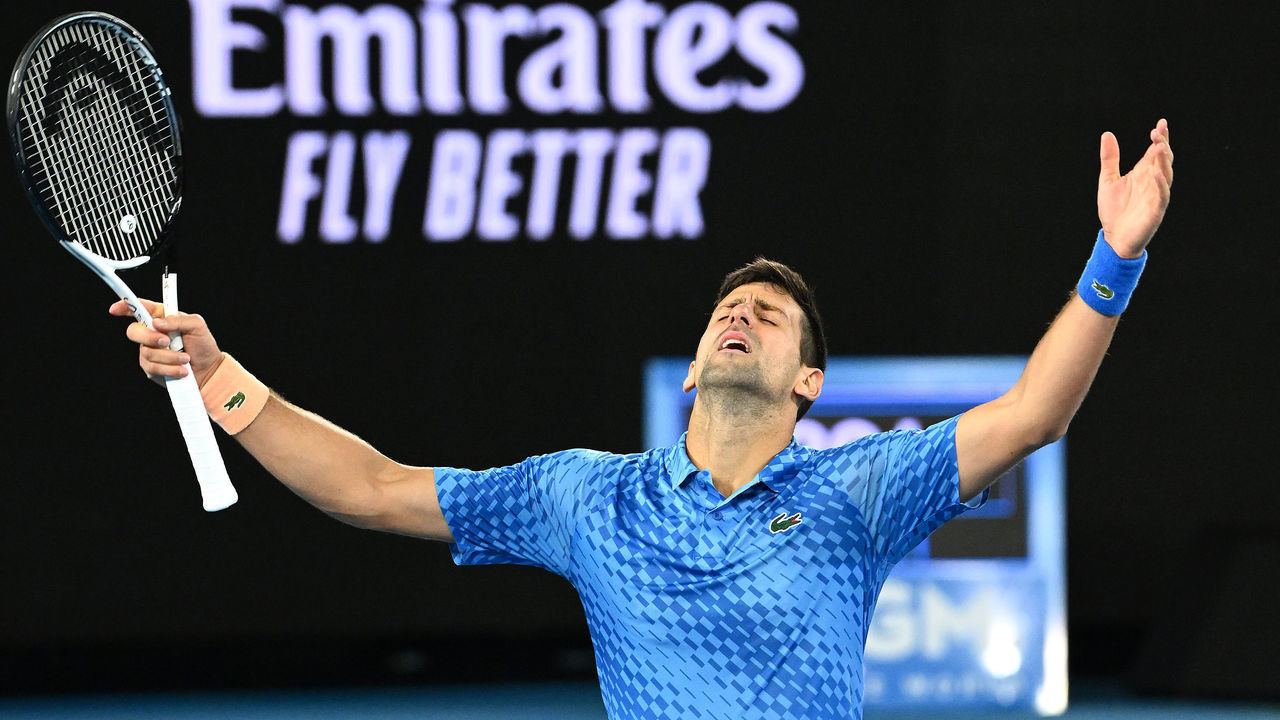 MELBOURNE, AUSTRALIA - JANUARY 21: Novak Djokovic of Serbia celebrates winning his third round singles match against Grigor Dimitrov of Bulgaria during day six of the 2023 Australian Open at Melbourne Park on January 21, 2023 in Melbourne, Australia.