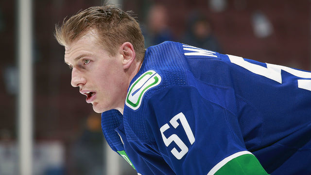 VANCOUVER, CANADA - JANUARY 3: Tyler Myers #57 of the Vancouver Canucks looks on from the bench during their NHL game against the New York Islanders at Rogers Arena January 3, 2023 in Vancouver, British Columbia, Canada.