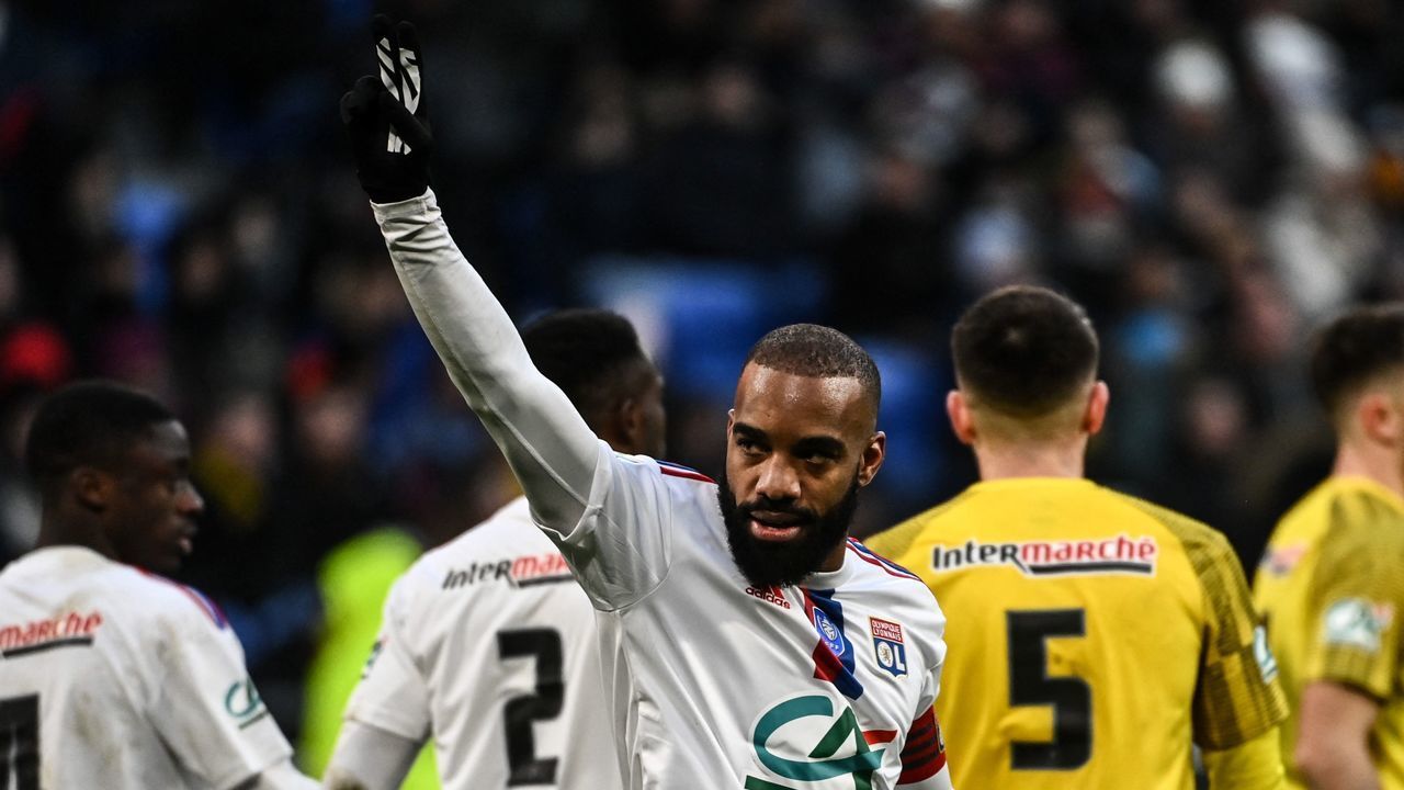 Lyon's French forward Alexandre Lacazette celebrates after scoring a goal during the French Cup round of 32 football match between Chambery Savoie Football and Olympique Lyonnais (OL) at the Groupama Stadium in Decines-Charpieu on January 21, 2023.