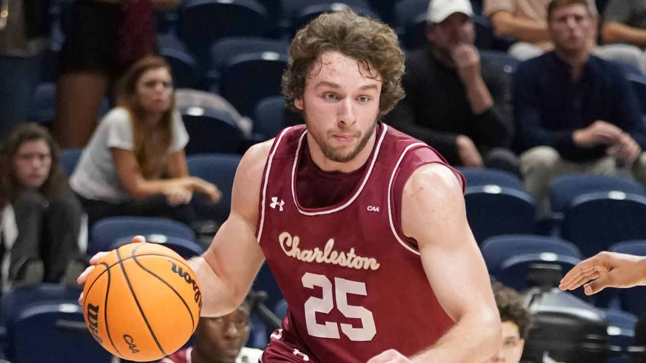 WASHINGTON, DC - MARCH 07: Ben Burnham #25 of the Charleston Cougars dribbles the ball during the semifinals of the Colonial Athletic Association Basketball Tournament against the North Carolina-Wilmington Seahawks at the Entertainment & Sports Arena on March 7, 2022 in Washington, DC.
