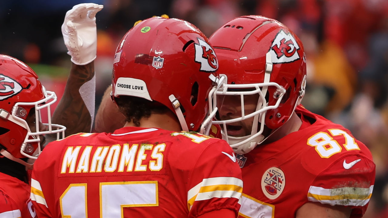 KANSAS CITY, MO - JANUARY 21: Kansas City Chiefs quarterback Patrick Mahomes (15) and tight end Travis Kelce (87) celebrate a touchdown in the first quarter of an AFC divisional playoff game between the Jacksonville Jaguars and Kansas City Chiefs on January 21, 2023 at GEHA Field at Arrowhead Stadium in Kansas City, MO.