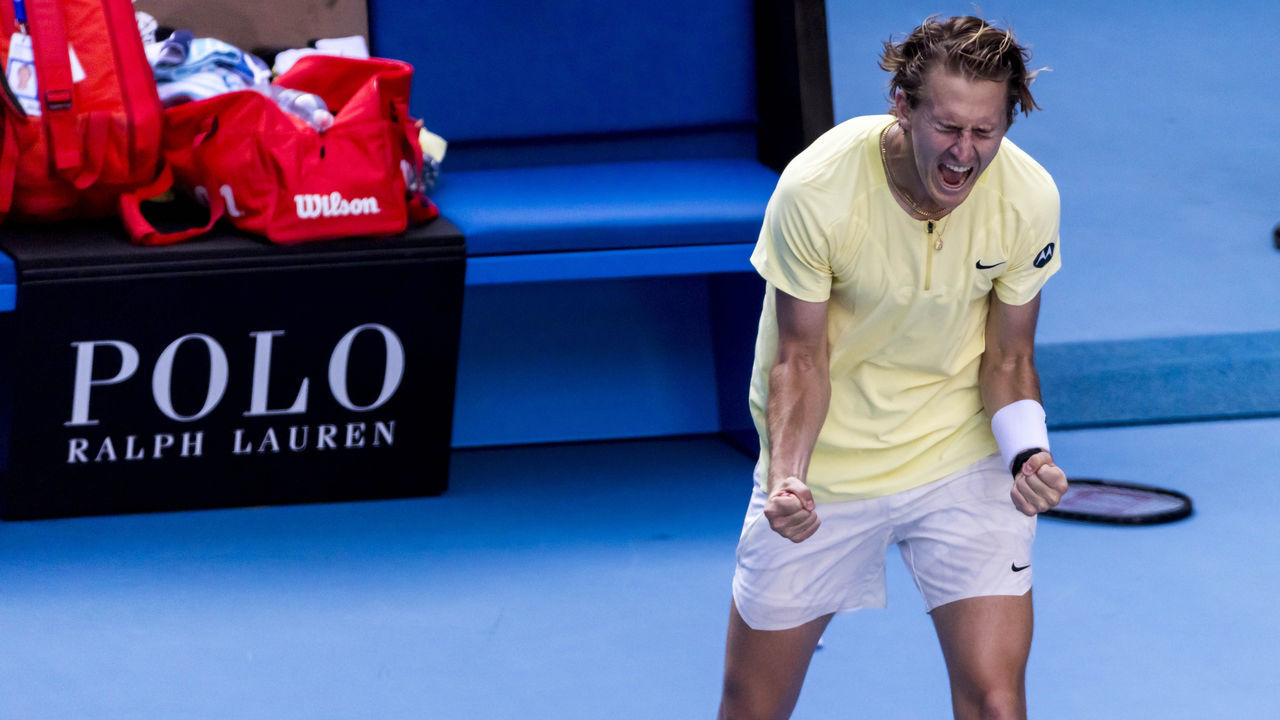 MELBOURNE, VIC - JANUARY 22: Sebastian Korda of the United States of America celebrates after winning his match during Round 4 of the 2023 Australian Open on January 22 2023, at Melbourne Park in Melbourne, Australia.