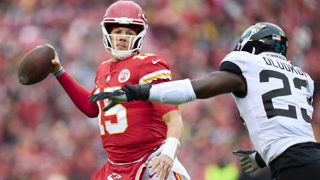 KANSAS CITY, MO - JANUARY 21: Patrick Mahomes #15 of the Kansas City Chiefs drops back to pass against the Jacksonville Jaguars during the first half at GEHA Field at Arrowhead Stadium on January 21, 2023 in Kansas City, Missouri.
