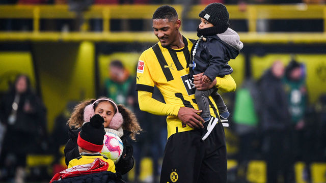 DORTMUND, GERMANY - JANUARY 22: Sebastien Haller of Dortmund celebrates victory with his kids after the Bundesliga match between Borussia Dortmund and FC Augsburg at Signal Iduna Park on January 22, 2023 in Dortmund, Germany.