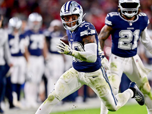 Tony Pollard of the Dallas Cowboys carries the ball against the