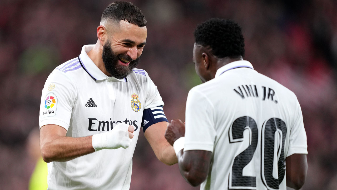 BILBAO, SPAIN - JANUARY 22: Karim Benzema of Real Madrid celebrates with teammate Vinicius Junior after scoring the sides first goal during the LaLiga Santander match between Athletic Club and Real Madrid CF at San Mames Stadium on January 22, 2023 in Bilbao, Spain.