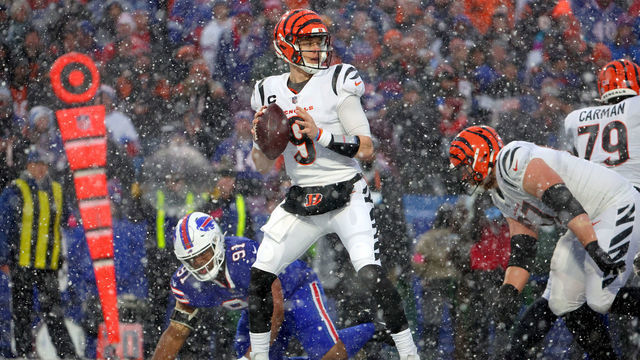 ORCHARD PARK, NEW YORK - JANUARY 22: Joe Burrow #9 of the Cincinnati Bengals looks to throw a pass against the Buffalo Bills during the second quarter in the AFC Divisional Playoff game at Highmark Stadium on January 22, 2023 in Orchard Park, New York.