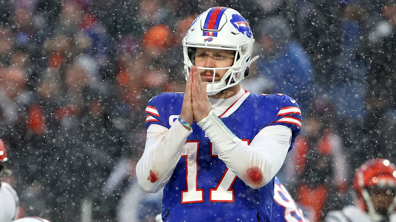 ORCHARD PARK, NEW YORK - JANUARY 22: Josh Allen #17 of the Buffalo Bills reacts against the Cincinnati Bengals during the third quarter in the AFC Divisional Playoff game at Highmark Stadium on January 22, 2023 in Orchard Park, New York.