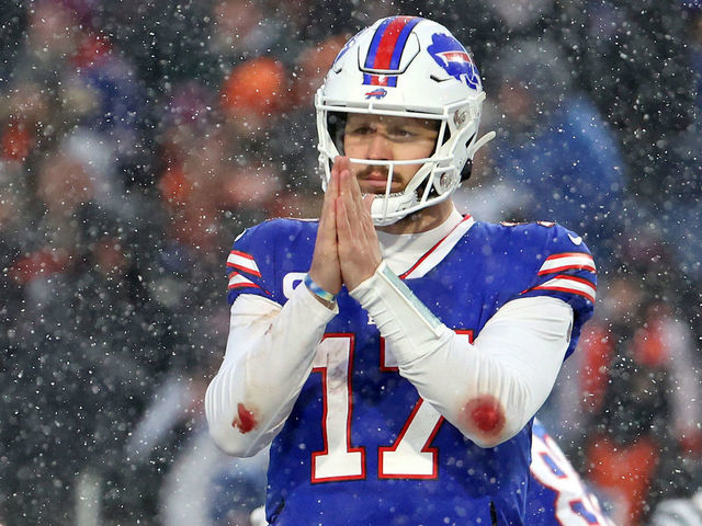 ORCHARD PARK, NEW YORK - JANUARY 22: Josh Allen #17 of the Buffalo Bills reacts against the Cincinnati Bengals during the third quarter in the AFC Divisional Playoff game at Highmark Stadium on January 22, 2023 in Orchard Park, New York.