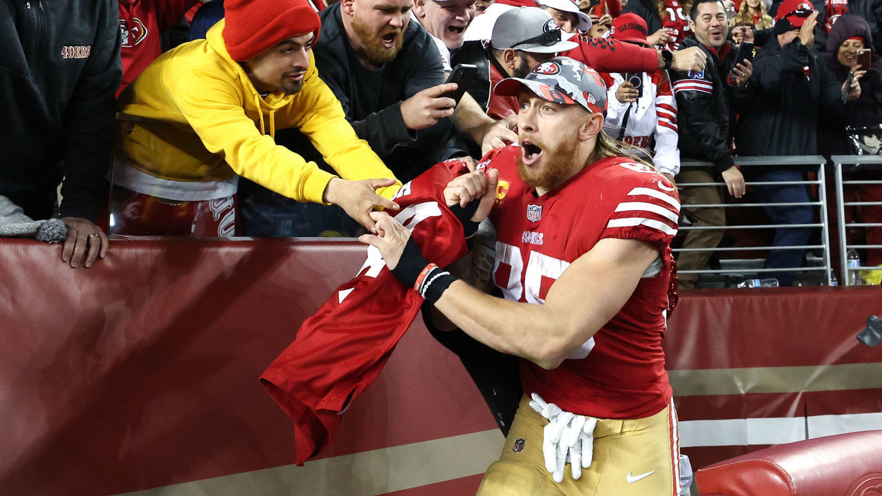 SANTA CLARA, CALIFORNIA - JANUARY 22: George Kittle #85 of the San Francisco 49ers celebrates with fans after defeating the Dallas Cowboys 19-12 in the NFC Divisional Playoff game at Levi's Stadium on January 22, 2023 in Santa Clara, California.