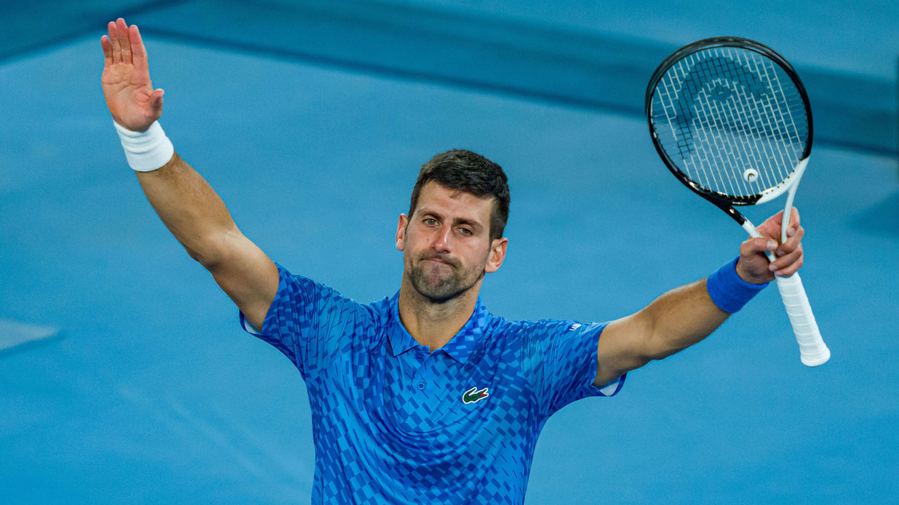 MELBOURNE, AUSTRALIA - JANUARY 23: Novak Djokovic of Serbia celebrates victory in the fourth round singles match against Alex de Minaur of Australia during day eight of the 2023 Australian Open at Melbourne Park on January 23, 2023 in Melbourne, Australia.