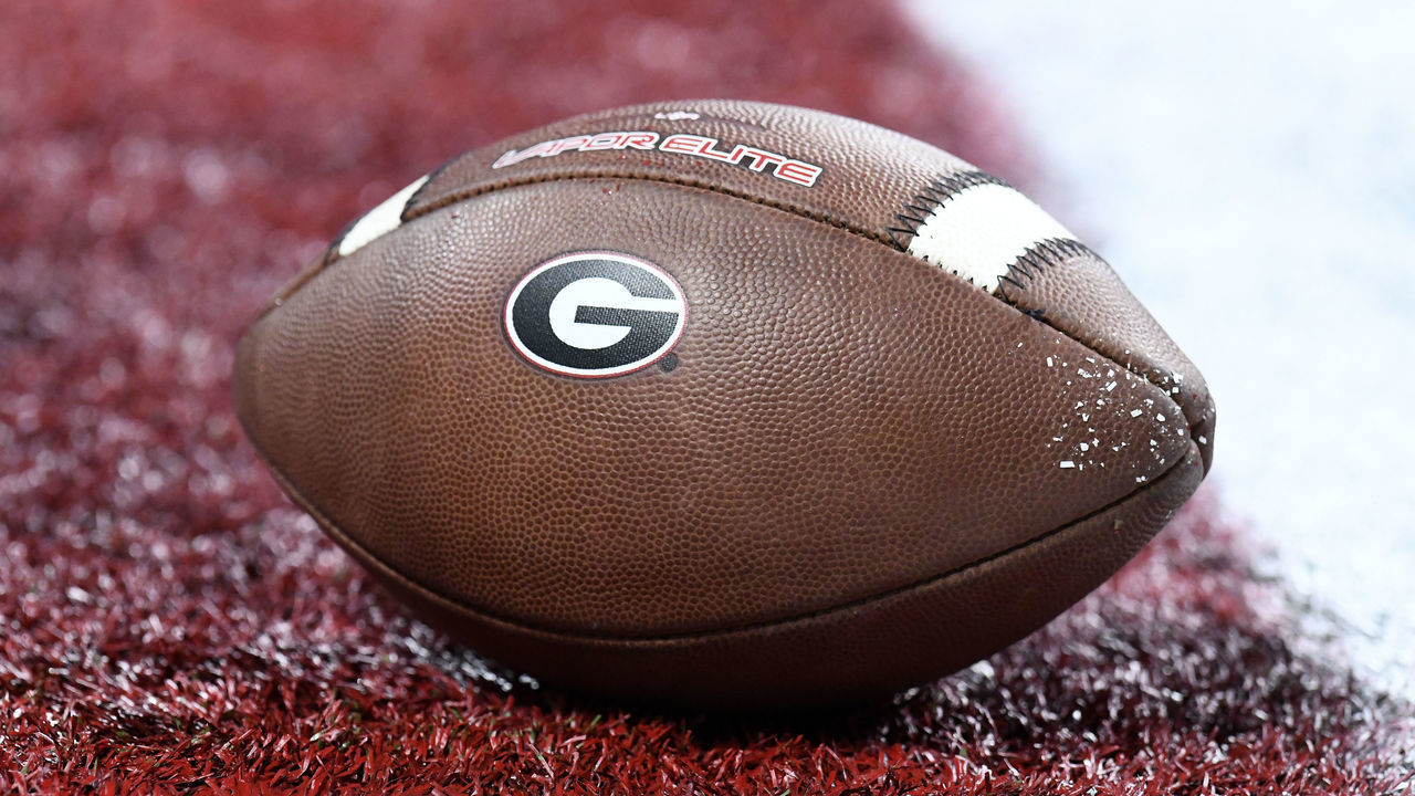 INDIANAPOLIS, IN - JANUARY 10: A Georgia Bulldogs logo is seen on the side of a football before the start of the Alabama Crimson Tide versus the Georgia Bulldogs in the College Football Playoff National Championship, on January 10, 2022, at Lucas Oil Stadium in Indianapolis, IN.