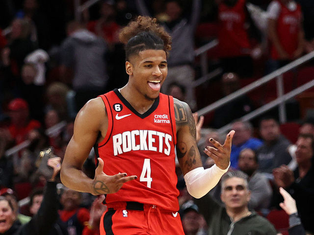 HOUSTON, TEXAS - JANUARY 23: Jalen Green #4 of the Houston Rockets reacts after making a three point basket against the Minnesota Timberwolves during the fourth quarter at Toyota Center on January 23, 2023 in Houston, Texas.