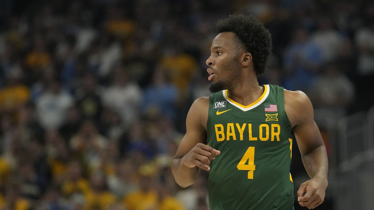 MILWAUKEE, WISCONSIN - NOVEMBER 29: LJ Cryer #4 of the Baylor Bears in action against the Marquette Golden Eagles during the first half at Fiserv Forum on November 29, 2022 in Milwaukee, Wisconsin.