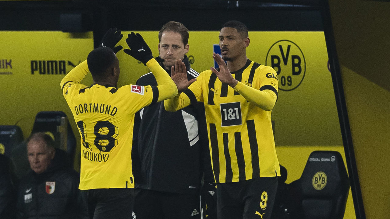 DORTMUND, GERMANY - JANUARY 22: Sebastien Haller and Youssoufa Moukoko of Borussia Dortmund during the Bundesliga match between Borussia Dortmund and FC Augsburg at Signal Iduna Park on January 22, 2023 in Dortmund, Germany.