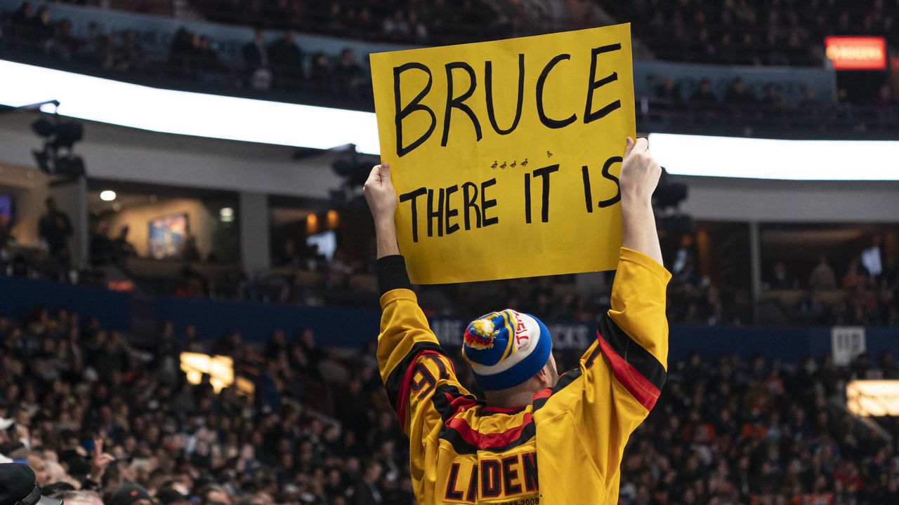 VANCOUVER, CANADA - JANUARY 21: A fan holds up a sign in support of Bruce Boudreau head coach of the Vancouver Canucks during NHL action between the Vancouver Canucks and the Edmonton Oilers on January, 21, 2023 at Rogers Arena in Vancouver, British Columbia, Canada.