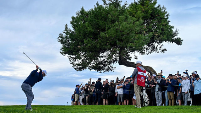 LA JOLLA, CALIFORNIA - JANUARY 29: Jon Rahm of Spain hits from the rough of the sixth hole after an errant shot while playing the second hole during the final round of The Farmers Insurance Open on the South Course at Torrey Pines Golf Course on January 29, 2022 in La Jolla, California.