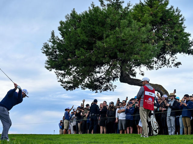 LA JOLLA, CALIFORNIA - JANUARY 29: Jon Rahm of Spain hits from the rough of the sixth hole after an errant shot while playing the second hole during the final round of The Farmers Insurance Open on the South Course at Torrey Pines Golf Course on January 29, 2022 in La Jolla, California.