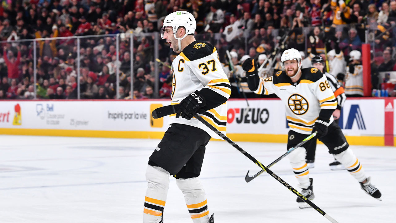 MONTREAL, CANADA - JANUARY 24: Patrice Bergeron #37 of the Boston Bruins reacts as he celebrates his goal during the third period of the game against the Montreal Canadiens at Centre Bell on January 24, 2023 in Montreal, Quebec, Canada. The Boston Bruins defeated the Montreal Canadiens 4-2.