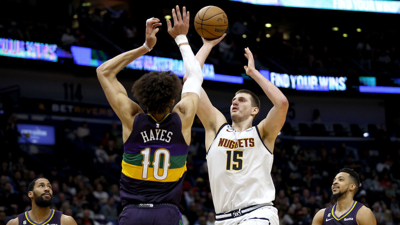 NEW ORLEANS, LOUISIANA - JANUARY 24: Nikola Jokic #15 of the Denver Nuggets shoots over Jaxson Hayes #10 of the New Orleans Pelicans during the third quarter of an NBA game at Smoothie King Center on January 24, 2023 in New Orleans, Louisiana.
