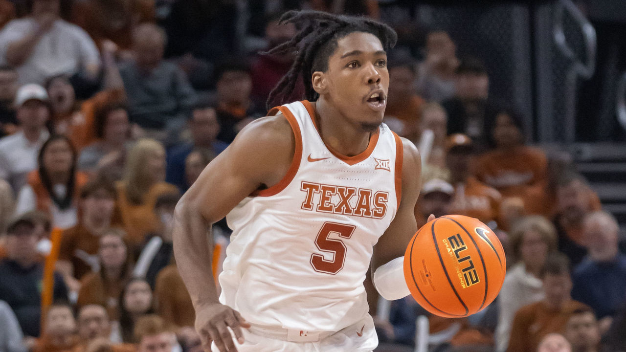 AUSTIN, TX - DECEMBER 27: Texas Longhorns guard Marcus Carr (5) brings the ball up court during the game between Texas Longhorns and Texas A&M Commerce Lions on December 27, 2022, at Moody Center in Austin, TX.
