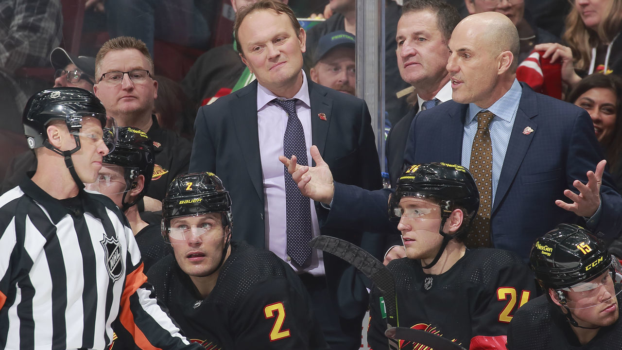 VANCOUVER, CANADA - JANUARY 24: The head coach Rick Tocchet of the Vancouver Canucks discusses a call with the referee during the second period of their NHL game against the Chicago Blackhawks at Rogers Arena January 24, 2023 in Vancouver, British Columbia, Canada.