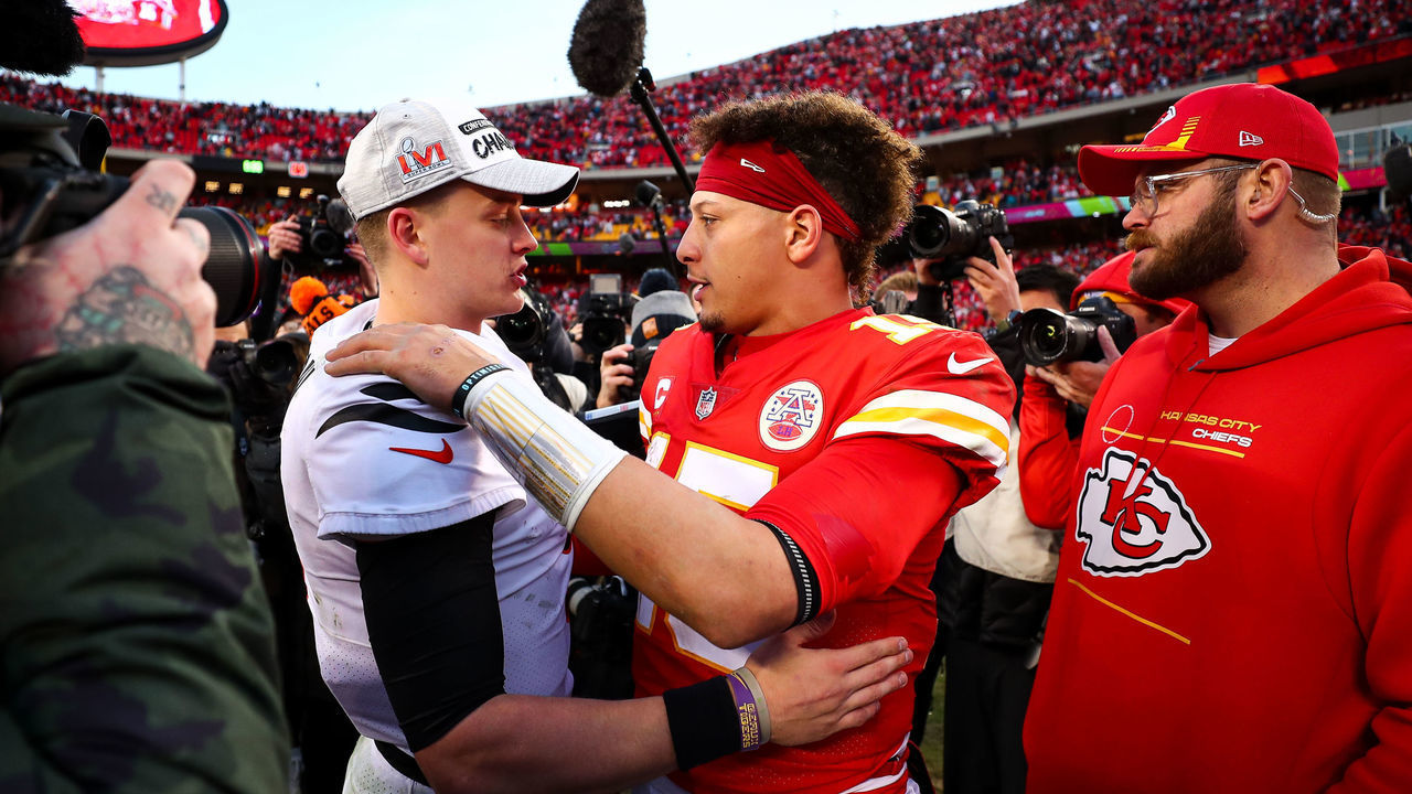 KANSAS CITY, MO - JANUARY 30: Joe Burrow #9 of the Cincinnati Bengals hugs Patrick Mahomes #15 of the Kansas City Chiefs after the AFC Championship Game at GEHA Field at Arrowhead Stadium on January 30, 2022 in Kansas City, Missouri.