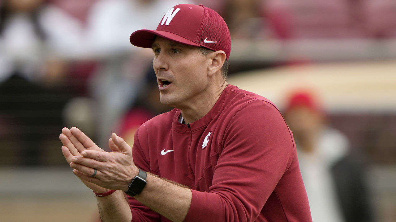 STANFORD, CALIFORNIA - NOVEMBER 05: Head coach Jake Dickert of the Washington State Cougars looks on while his team warms up during pregame warm ups prior to playing the Stanford Cardinal in a NCAA football game at Stanford Stadium on November 05, 2022 in Stanford, California.