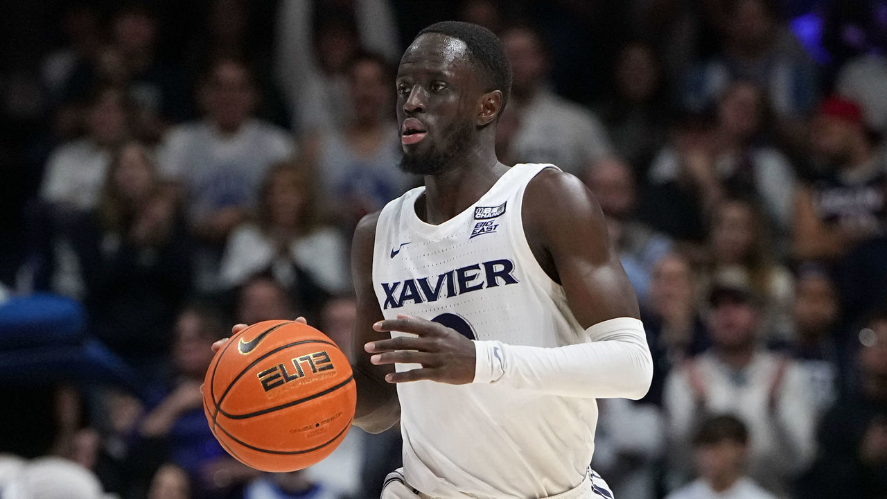 CINCINNATI, OHIO - DECEMBER 31: Souley Boum #0 of the Xavier Musketeers dribbles the ball in the second half against the Connecticut Huskies at the Cintas Center on December 31, 2022 in Cincinnati, Ohio.