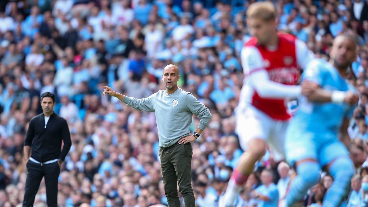 MANCHESTER, ENGLAND - AUGUST 28: Pep Guardiola the head coach / manager of Manchester City looks on during the Premier League match between Manchester City and Arsenal at Etihad Stadium on August 28, 2021 in Manchester, England.