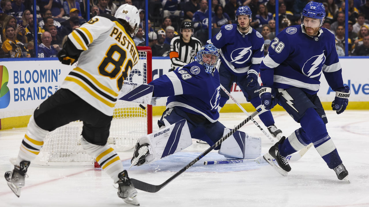 TAMPA, FL - NOVEMBER 21: Goalie Andrei Vasilevskiy #88 of the Tampa Bay Lightning gives up a goal against David Pastrnak #88 of the Boston Bruins during the third period at Amalie Arena on November 21, 2022 in Tampa, Florida.