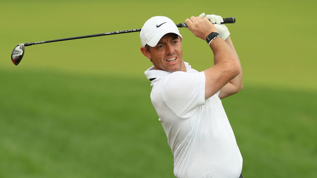DUBAI, UNITED ARAB EMIRATES - JANUARY 26: Rory McIlroy of Northern Ireland plays his second shot 10th hole during Day One of the Hero Dubai Desert Classic at Emirates Golf Club on January 26, 2023 in Dubai, United Arab Emirates.