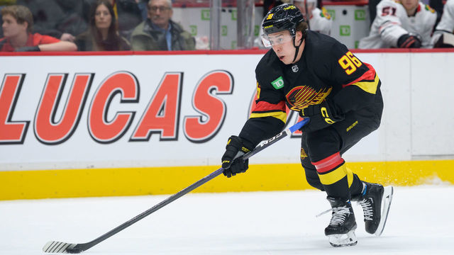 VANCOUVER, CANADA - JANUARY 24: Andrei Kuzmenko #96 of the Vancouver Canucks skates with the puck during the first period of their NHL game against the Chicago Blackhawks at Rogers Arena on January 24, 2023 in Vancouver, British Columbia, Canada.