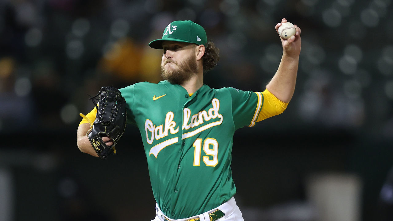 OAKLAND, CALIFORNIA - OCTOBER 04: Cole Irvin #19 of the Oakland Athletics pitches against the Los Angeles Angels at RingCentral Coliseum on October 04, 2022 in Oakland, California.