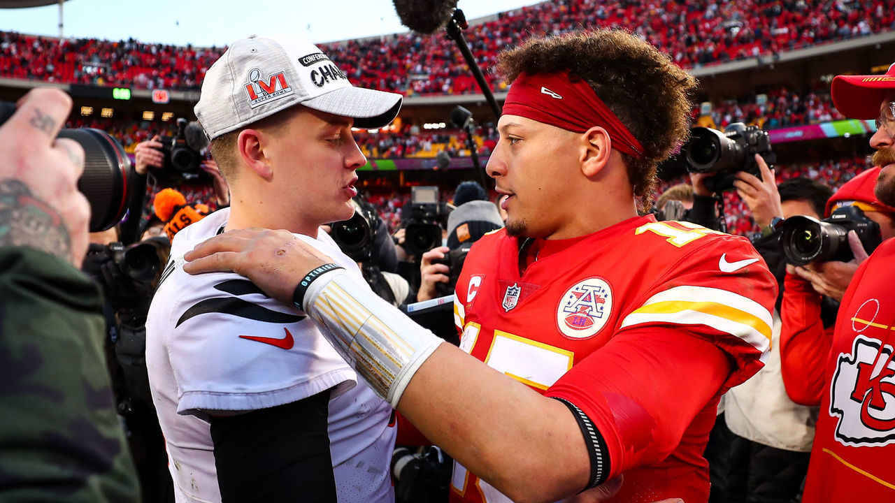 KANSAS CITY, MO - JANUARY 30: Joe Burrow #9 of the Cincinnati Bengals hugs Patrick Mahomes #15 of the Kansas City Chiefs after the AFC Championship Game at GEHA Field at Arrowhead Stadium on January 30, 2022 in Kansas City, Missouri.
